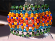 Браслет крестиком